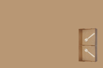 Design place a box focus at spoon fork wood small size put in paper box brown colored or snack box.Presenting the concept of environmental protection recyclable paper box 