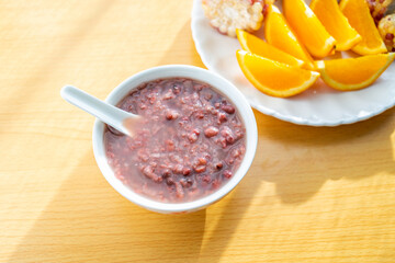 Chinese nutritious breakfast with red bean porridge and corn