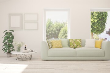 White living room with sofa and summer landscape in window. Scandinavian interior design. 3D illustration