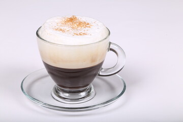 Delicious coffee  in a glass cup on a white background