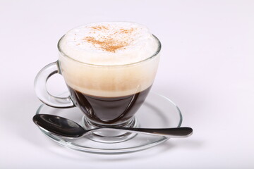 Delicious coffee  in a glass cup on a white background