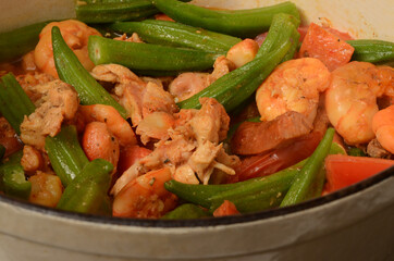 GUMBO INGREDIENTS, SHRIMPS, PORK SAUSAGE, CKICKEN, OKRA, GARLIC, TOMATOES, SPICES, GUMBO FILE