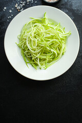 zucchini spaghetti salad vegetable snack natural product
ingredient food background top view copy space for text organic eating healthy keto or paleo diet raw