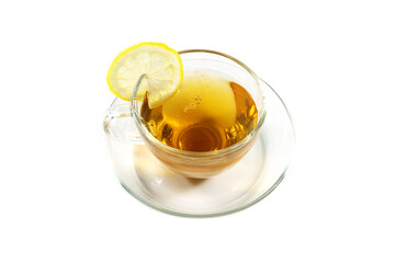 Black tea with a lemon slice in a glass cup, isolated on a white background, copy space