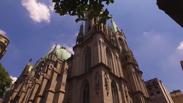 Sao Paulo Catholic Cathedral Under Blue Sky. Tilt Down View of Historic Landmark Brazil