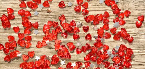 Red hearts on a brown background