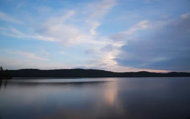Foto op Canvas Sunset over a lake © Joe