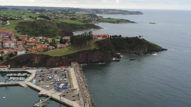 Beautiful landscape in coastal village of Candas in Asturias. Spain. Aerial Drone Footage