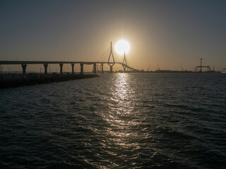 sunset on the Constitution bridge, called La Pepa, in the Bay of Cadiz, Andalusia. Spain. Europe
