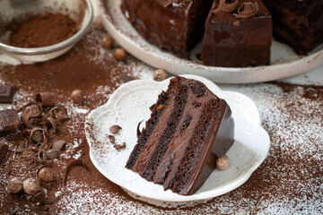 Chocolate cake with chocolate glaze and cream, 