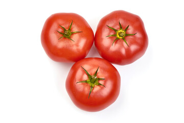 Fresh ripe tomatoes with basil leaves, isolated on white background