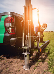 Soil examination. Collecting black soil on the field for examination