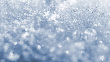 icicles hanging from the snowy roof, background, selective focus