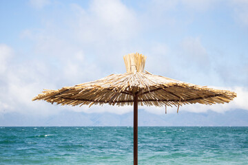 straw umbrella  on the beach