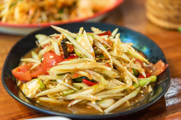 Crab Som Tam, spicy papaya salad with crab.