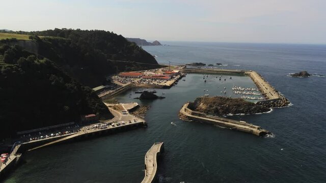 Harbour in Cudillero, coastal village of Asturias,Spain. Aerial Drone Footage