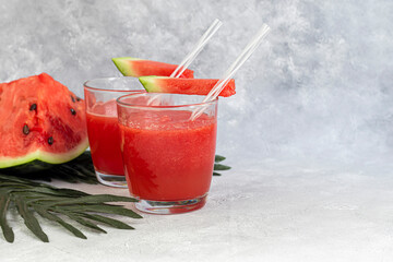 Watermelon pulp smoothie. Delicious red sliced watermelon on a plate. Stock of fiber and fructose....