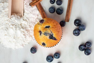 Fototapeta na wymiar Blueberry cupcakes on a marble background