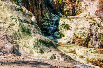 Rocky cliffs in volcanic landscape of Wai-O-Tapu