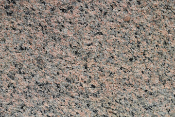 he texture of natural stone is brown granite