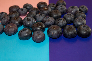Blueberries on a colored background