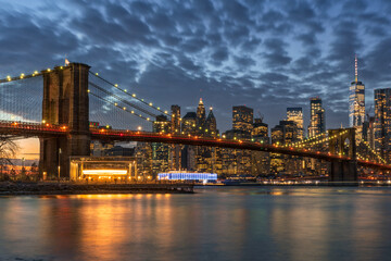 Naklejka na ściany i meble Brooklyn Bridge Blue Hour Sunset and Manhattan Skyline, New York City