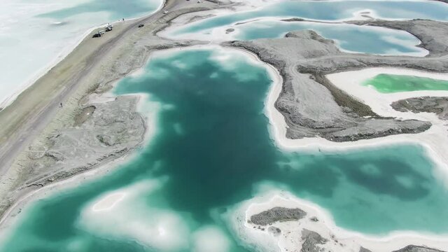 Aerial view of emerald lake (salt lake) located in China QingHai DaChaiDan(Big Chaidam / Da Qaidam). Drone shot footage 4k(UHD).