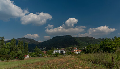 Fototapeta na wymiar Sunny blue sky day in valley of river Labe in Sebuzin village