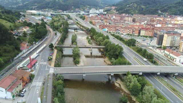 Bridge and river in Mieres,Asturias,Spain. Aerial Drone Footage