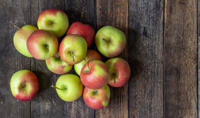 apples on wooden table with old planks