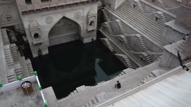 Toorji Ka Jhalra or Toorji&rsquo;s Step Well,Jodhpur, Rajasthan, India. Stepwells are wells in which the water is reached by descending a set of steps to the water level. Famous vintage Indian architecture.