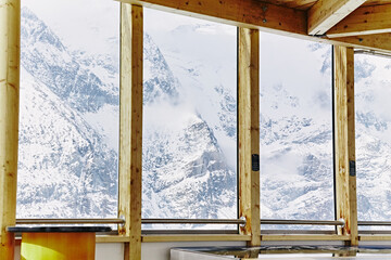The window view of the Alps mountains good weather winter. View from the window frame. Austria 