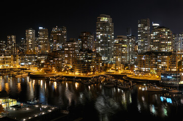 Fototapeta na wymiar False Creek Yacht Club and West End Vancouver Condominiums at night