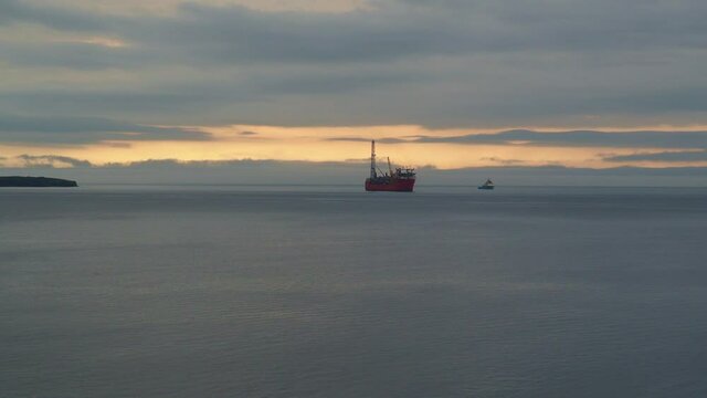 CONCEPTION BAY SOUTH, NEWFOUNDLAND AND LABRADOR, CANADA &ndash; AUGUST 2, 2020. The Terra Nova offshore floating oil platform and supply ship en route to Europe, taken on August 2, 2020 in Conception Bay.