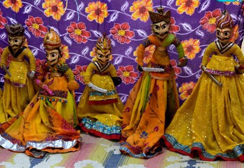 Fototapeta na wymiar costumeHand made puppets called kathputli in inda. It is the piece of tradition in state of Rajasthan India 