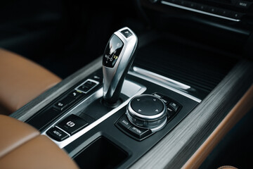 Fototapeta premium Modern and expensive car interior and gearbox shift handle 