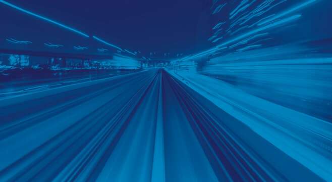 Abstract high speed technology POV train motion blurred concept from the Yuikamome monorail in Tokyo, Japan