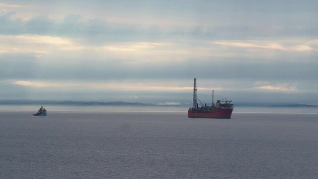 CONCEPTION BAY SOUTH, NEWFOUNDLAND AND LABRADOR, CANADA &ndash; AUGUST 2, 2020. The Terra Nova offshore floating oil platform and supply ship en route to Europe, taken on August 2, 2020 in Conception Bay.