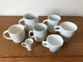 Obraz na płótnie Canvas Set of Various White Cups