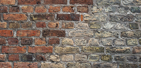 background of old red brick wall. Texture of grunge brickwork