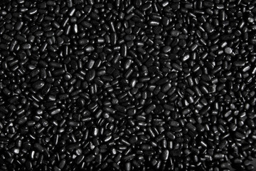 Black sprinkles macro background, halloween theme