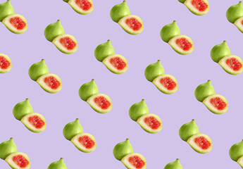 Pattern of cut and whole green figs on lavender background