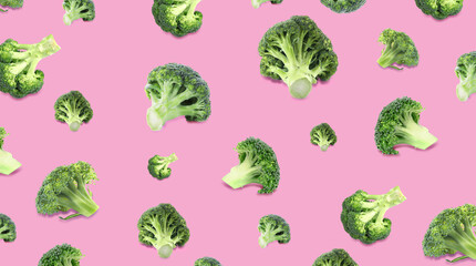 Pattern of fresh green broccoli on pink background, banner design