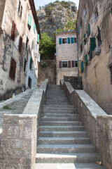 Staircase with the mountains behind in the historic walled town of Kotor, Montenegro