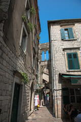 Fototapeta na wymiar The picturesque buildings and streets of the historic walled town of Kotor, Montenegro
