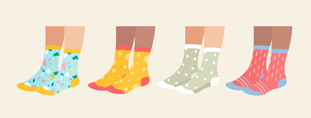 Socks on legs vector illustration set. Cartoon flat collection of underwear accessories, sock pair with colorful ornament, print and pattern, funny warm socks footwear isolated on white