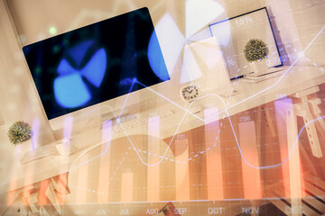 Double exposure of financial graph drawing and office interior background. Concept of stock market.
