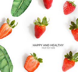 Creative happy and healthy new year card made of strawberries and leaves on the white background.  strawberries happy and healthy, top view, festive greeting card.