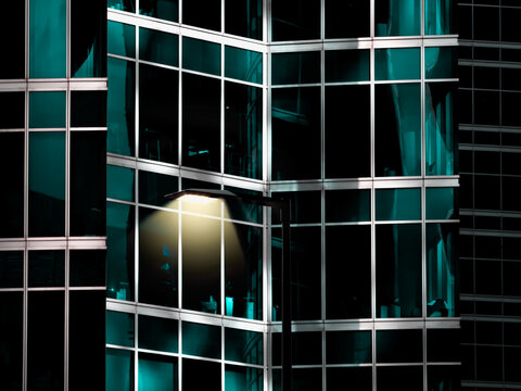 Mirror cube fragment of a building with a lamp - Powered by Adobe