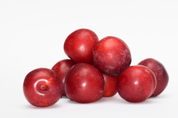 Fresh Fruits from India Red Plums known as Alubukhara or Aloobukhara in Indian Subcontinent. Heap...